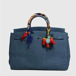 Stylish Blue Handbag with Colorful Accents